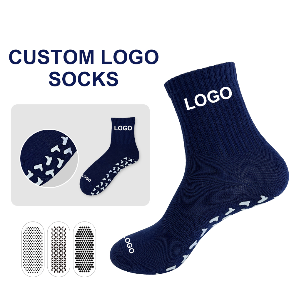 Navy ribbed crew Pilates and yoga grip sock presentation showing customizable cuff-logo placement and light-colored sole-grip details